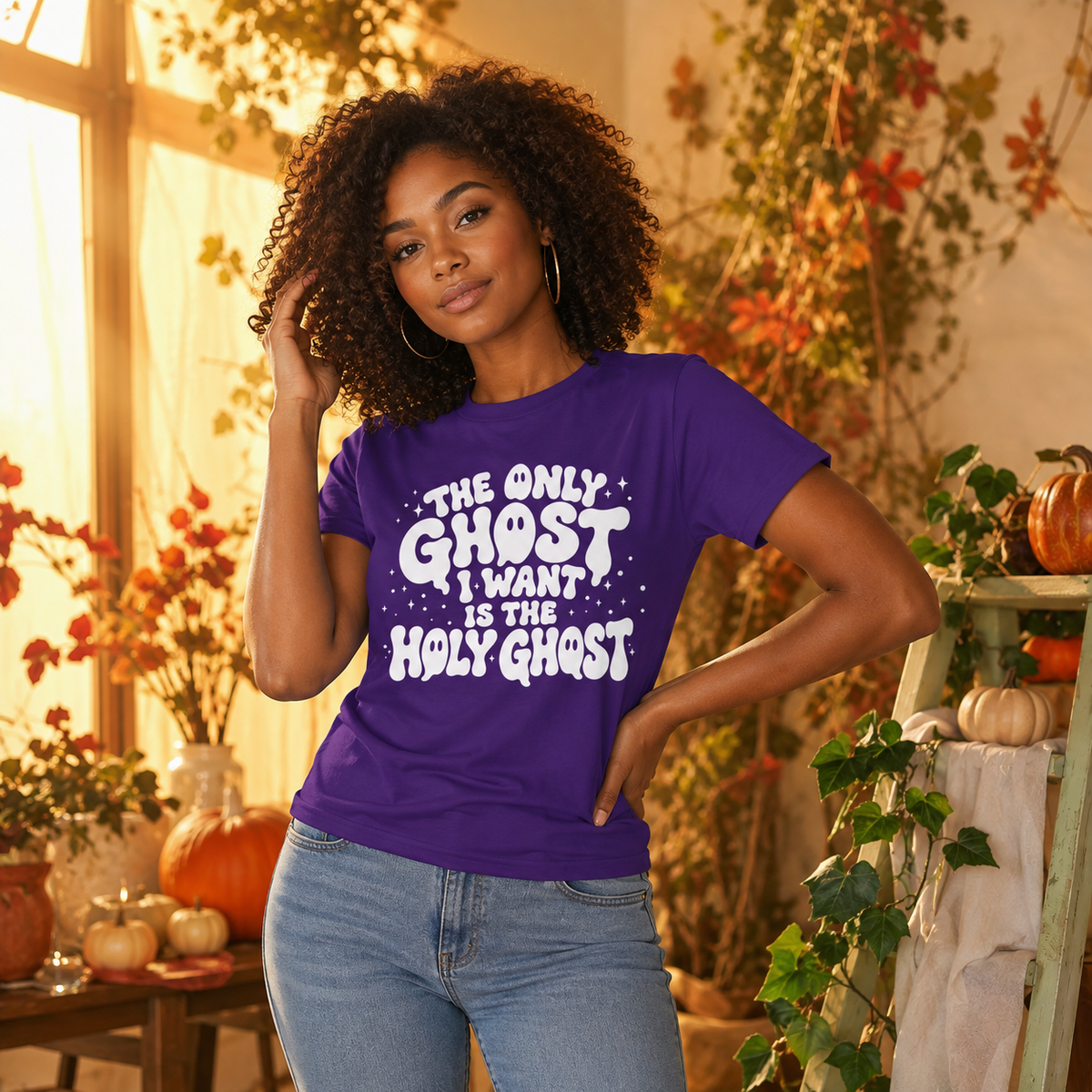 Black woman wearing the purple Holy Ghost Christian Halloween graphic tee in a warm autumn setting.